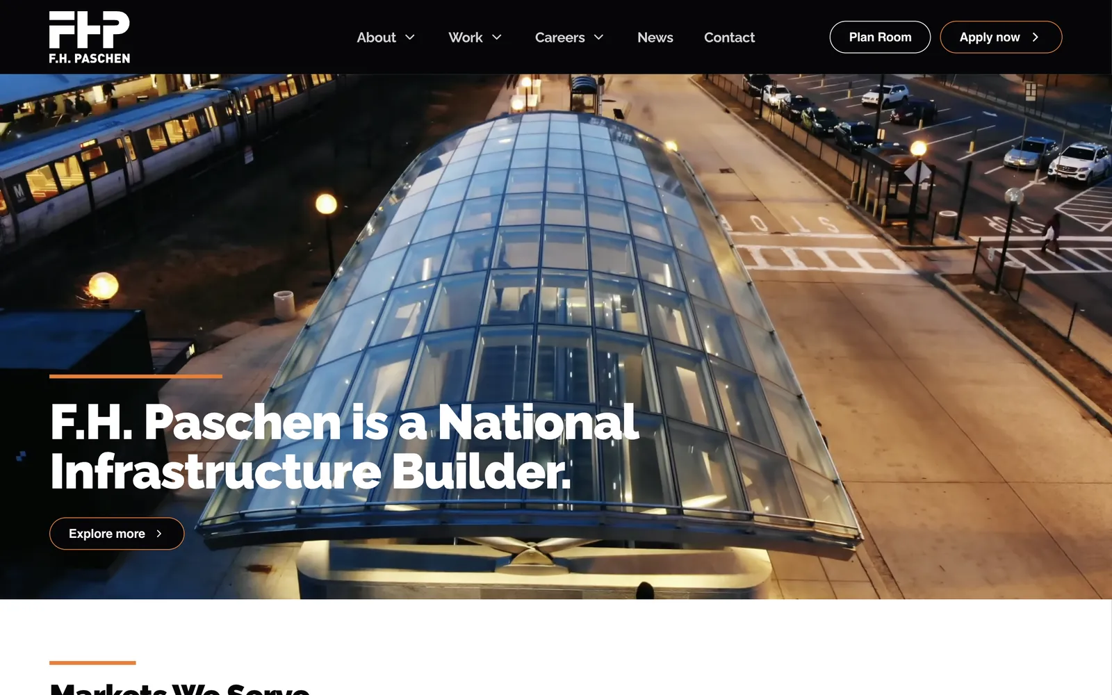 F.H. Paschen homepage with a video hero of a lit transit station canopy beside a train